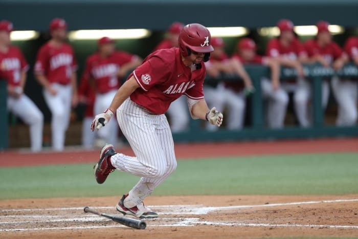 Alabama outfielder Tommy Seidl (20) runs to first in the Crimson Tide's 10-2 win over the Troy Trojans on April 4, 2023 at Sewell-Thomas Stadium in Tuscaloosa, Ala.